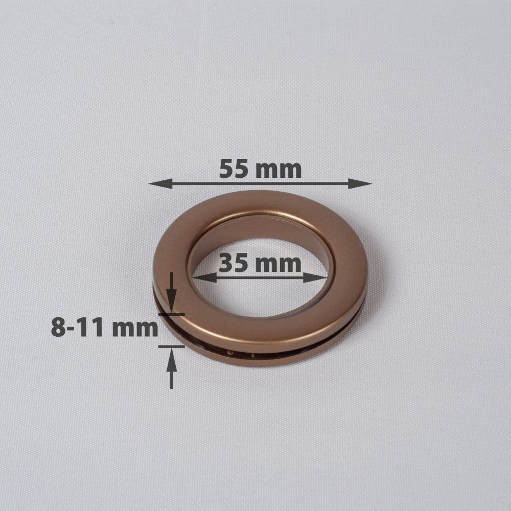 Compressible rings for curtains