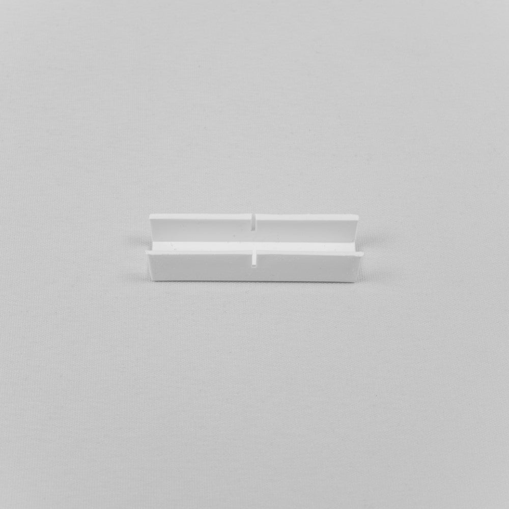 Accessory for ceiling mounted curtain rails white colour